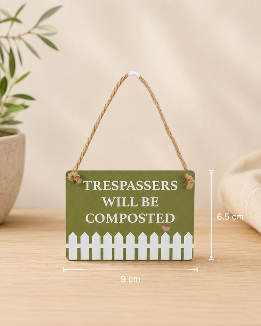 Trespassers will be composted sign